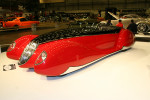 Framlidne Hotrod-ikonen Boyd Coddingtons sista bygge, &ldquo;The French Connection&rdquo;. V12-motor p&aring; &ouml;ver 12 liter, handknackad kaross efter f&ouml;rebild av en fransk Delahaye Type 165 Roadster och inredning av bland annat strutsskinn. Boyd sj&auml;lv fick tyv&auml;rr